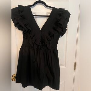 Gorgeous ruffled little black v neck dress